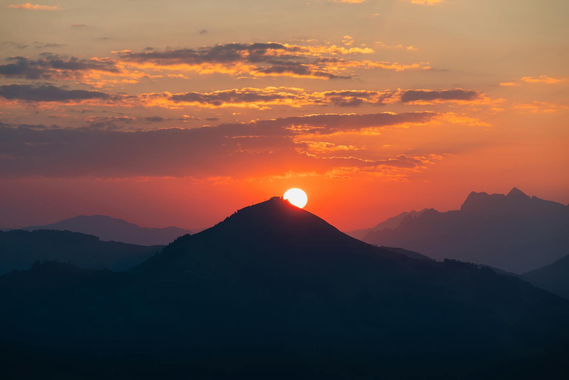Spectacular Sunrise Over Alpine Hills